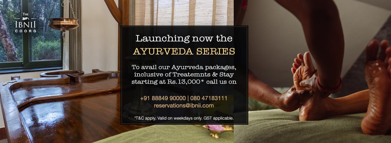 Website banner describing a new package series based on Ayurveda. The image depicts a traditional ayurveda table, with the treatment and massage being applied to someone.